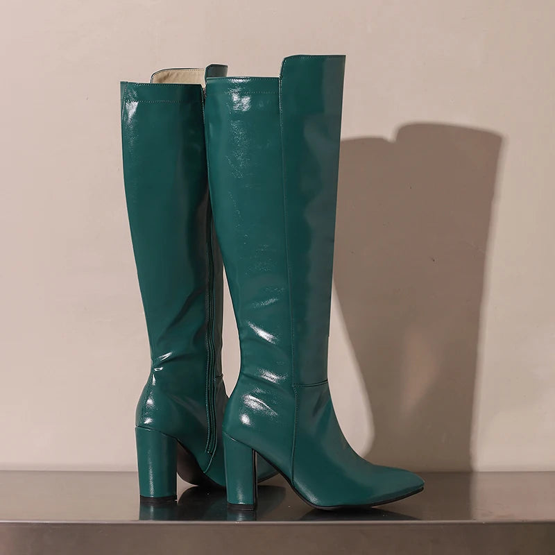 Rubber Rendezvous Mid Calf Boot Heels